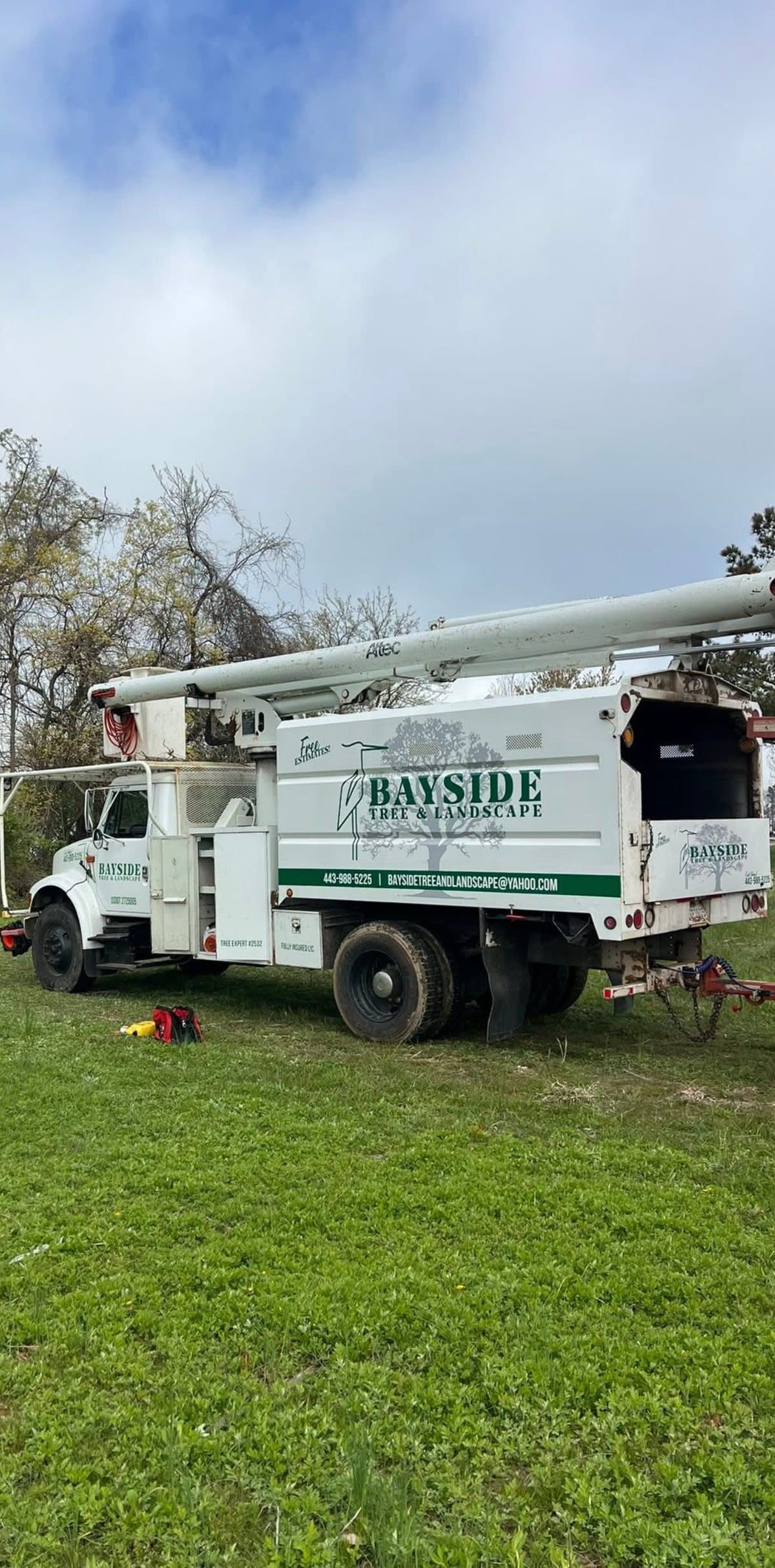 Bayside Tree and Landscape's licensed and insured bucket truck on a Maryland Eastern Shore job site