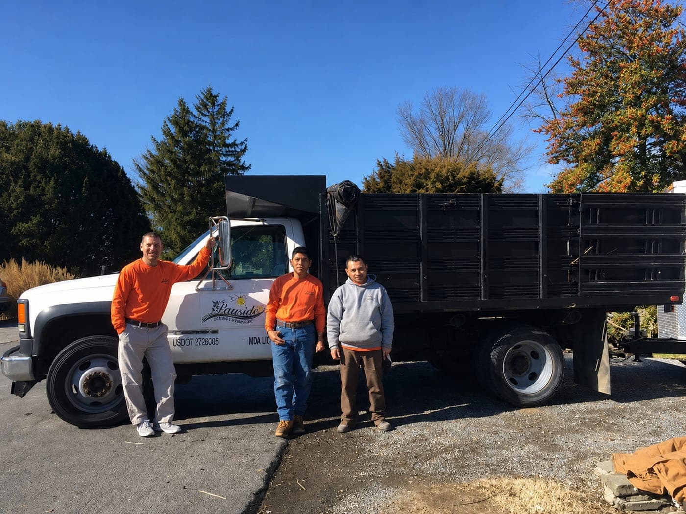 The Bayside Tree and Landscape crew with the company truck